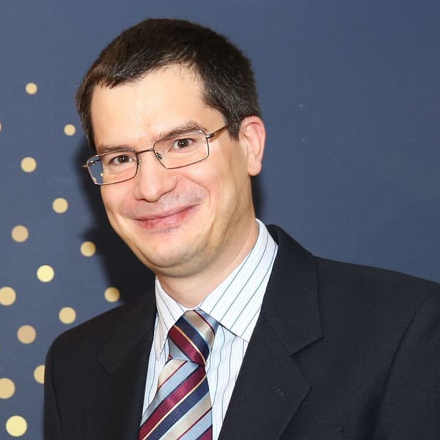 Portrait of Dennis Grigoratos